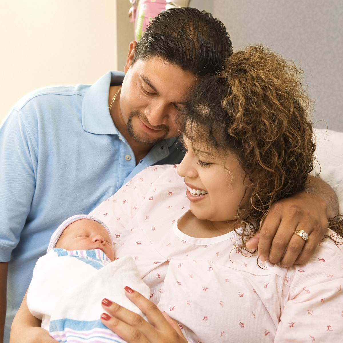 New parents with baby in hospital